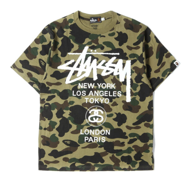 A BATHING APE ア ベイシング エイプ Tシャツ サイズ:M STUSSY コラボ 30周年記念 1stカモ 猿迷彩 ワールドツアー 半袖 クルーネック グリーンカモ トップス カットソー ストリート カジュアル ブラン